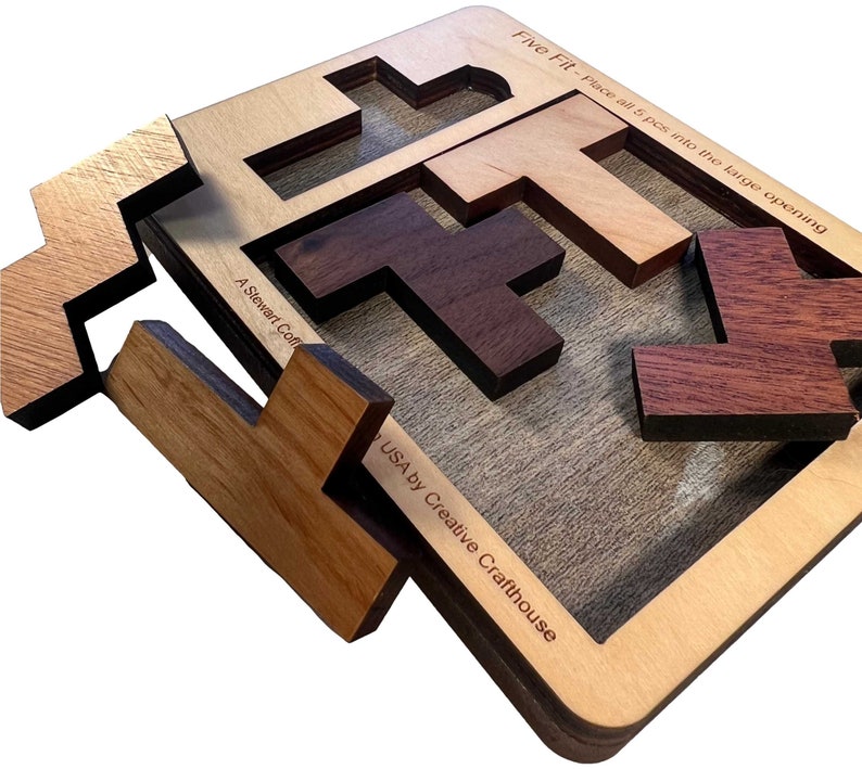 Five Fit wood brain teaser puzzle small size. A fun and difficult challenge! Made by Creative Crafthouse.