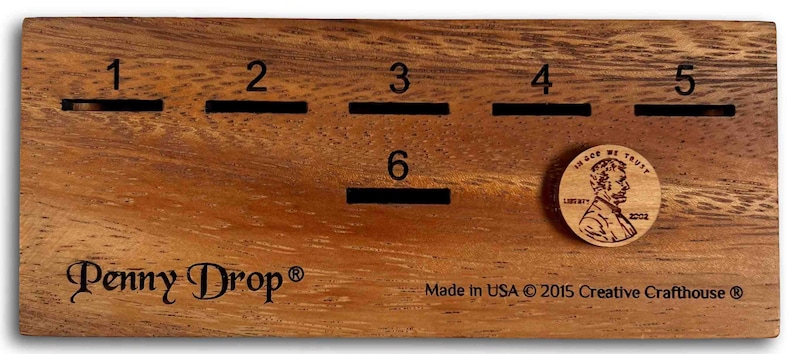 Penny Drop Small Wood Family or Bar Game. Amazing fun for all ages. Wooden dice included. Designed and made and copyrighted by Creative Crafthouse in Hudson, Florida.