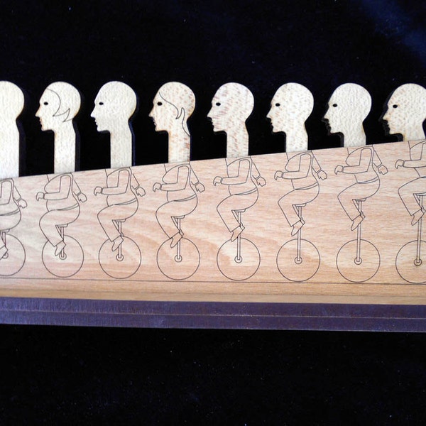 Holey Moley Premium Wood Brain Teaser Puzzle , 8 heads on Unicycles