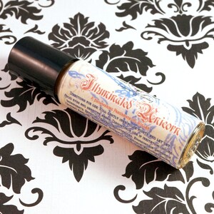 Verlichte eenhoorngeurolie rollerfles – 10 ml rollerparfum – appels, lavendel, linnen, eikenhout – jeneverbes