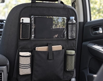 May include: A black car seat organizer featuring a clear tablet sleeve, two upper mesh pockets, two lower mesh pockets, and a central storage compartment. The organizer is secured to the back of a vehicle seat and displays the brand name Luneacie.