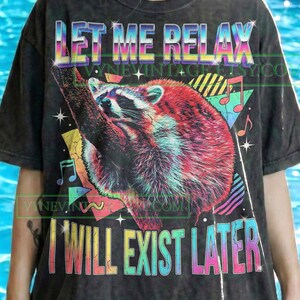 May include: A set of three ceramic mugs with a speckled, matte finish. The mugs are in shades of cream, light gray, and dark gray. Each mug has a simple, minimalist design and a rounded handle.