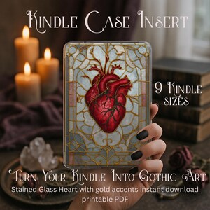 May include: Kindle case insert featuring a stained glass heart design with gold accents. The image shows a red heart with veins, set against a backdrop of blue and gray glass. The text reads "Turn Your Kindle Into Gothic Art" and "9 Kindle Sizes".