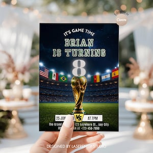 May include: A birthday party invitation with a soccer theme. The invitation features the text "IT'S GAME TIME BRIAN IS TURNING 8" above a golden trophy. The background shows a soccer stadium with flags. The date and time are also included.
