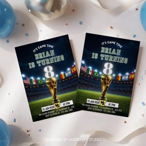May include: Two birthday party invitations with a soccer theme. The invitations feature a golden trophy, a soccer stadium, and flags. The text reads "It's Game Time, Brian is Turning 8". The date is June 25, 2030, at 7 PM.