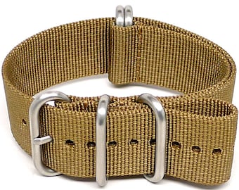 May include: A tan nylon watch strap with silver buckle and keeper loops.