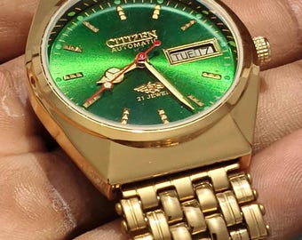 Classic Gold Citizen Quartz Glow in the Dark Calendar Watch  display picture 1
