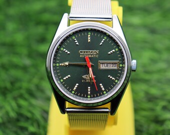 Orologio da polso automatico Citizen, movimento meccanico, 21 rubini, quadrante verde.