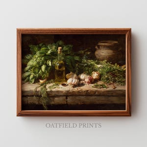 May include: A framed still life painting featuring a rustic wooden table laden with fresh herbs, garlic bulbs, and a bottle of olive oil. A large clay pot sits in the background. The artwork has a warm, earthy color palette.