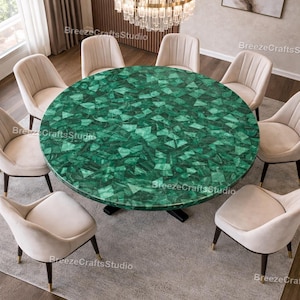 Luxe ronde eettafel met ingelegde edelstenen in willekeurig patroon – een opvallend tafelblad – een modern middelpunt voor de eet- en woonkamer – een salontafel |