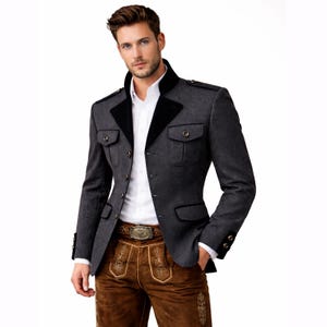 May include: A charcoal gray jacket with black velvet collar and trim, featuring two chest pockets and button details. The jacket is paired with brown leather pants and a decorative belt. The outfit is a traditional style.