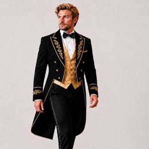 May include: A black tailcoat jacket featuring gold embroidery on the lapels and cuffs, paired with a gold patterned waistcoat, a white button-down shirt, a black bow tie, and black trousers with a side stripe detail along the outer leg seam.