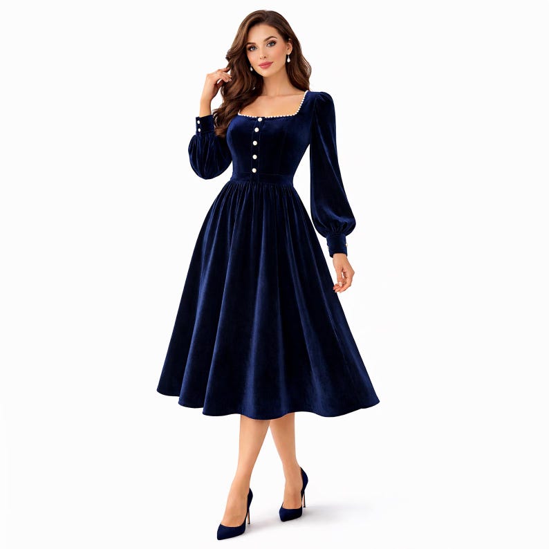 Elegant navy blue velvet midi dress with pearl trim, square neckline, long sleeves, and a modest feminine silhouette.