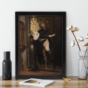 May include: A framed art print depicting a dark, historical scene of a person in a white head covering and black robes being carried by another figure in dark clothing, set against an ornate metal gate with warm, dim lighting and shadows.