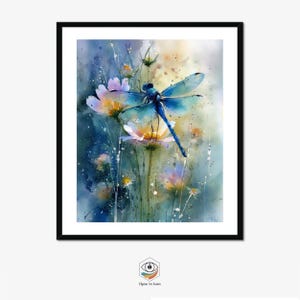 May include: Watercolor painting of a blue dragonfly perched on a flower. The artwork features soft, blended colors of blue, yellow, and pink, with a black frame. The dragonfly's wings are translucent, and the flowers have delicate petals.