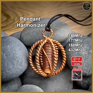 May include: A copper-colored pendant harmonizer necklace with a twisted rope design. The pendant has a cylindrical core and is suspended from a black cord. Text on the image includes "Pendant Harmonizer" and frequency details: 144Mhz, 177Mhz, 188Mhz, and 432Mhz.