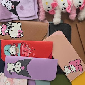 May include: An assortment of colorful Sanrio character-themed accessories, including socks, plush toys, notebooks, and eyeglass cases. The items feature characters like Hello Kitty, My Melody, and Kuromi, in various colors and designs.