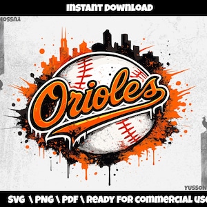 May include: A digital graphic featuring the word "Orioles" in orange and white, set against a baseball with orange stitching. The design includes an orange and black splatter effect, a cityscape silhouette, and the text "INSTANT DOWNLOAD".