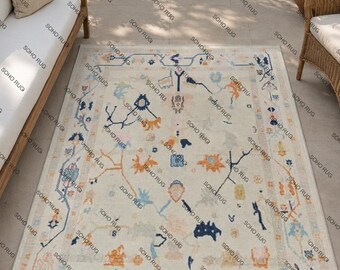 Handgeknoopt vloerkleed in Oushak-stijl: modern tribal geometrisch wollen tapijt.