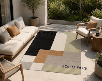 Tappeto in lana trapuntato a mano, con motivi astratti in stile Mid-Century Modern, nei toni del verde salvia e dei colori neutri.