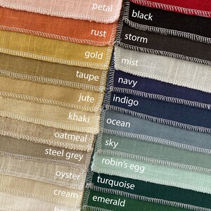 May include: A swatch card with 20 different fabric samples, each with a name label. The colors range from coral to aloe.