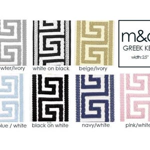 May include: A sample of eight different colored Greek key patterned ribbon trims. The colors are pewter/ivory, white on black, beige/ivory, pale blue/white, black on white, navy/white, and pink/white. The ribbon is 2.5 inches wide.