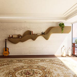 May include: A modern, wave-shaped wooden shelf with a natural finish, mounted on a textured white wall. The shelf displays books, a vintage radio, and decorative items. A guitar leans against the wall, and a patterned rug covers the floor.