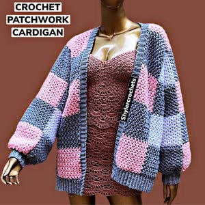 May include: A crochet patchwork cardigan featuring a checkerboard pattern of pink, light blue, and dark gray squares. The garment has long sleeves and a ribbed trim. Text on the image reads: CROCHET PATCHWORK CARDIGAN and Shylercrochets.