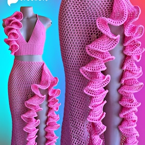 May include: Pink crochet two-piece set featuring a halter top and a high-waisted skirt, both adorned with ruffled trim. The set is displayed on a mannequin. The brand name "Shyler Crochets" is visible in the upper left corner.