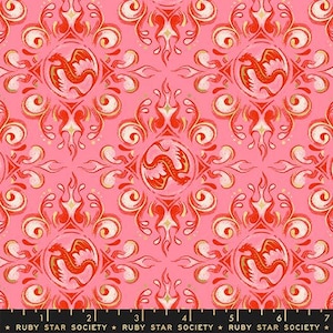 May include: Pink fabric with a repeating pattern of red dragons within circular frames, surrounded by stylized flames and scrollwork. The design includes gold and cream accents. The fabric is from Ruby Star Society.