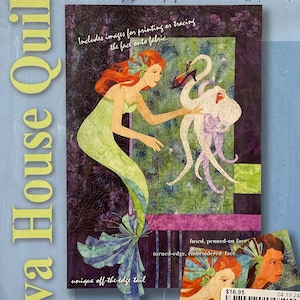 May include: A wall hanging quilt pattern titled "For You My Dear" featuring a mermaid with red hair and a green tail, interacting with a white creature. The design includes the text "Includes images for printing or tracing the face onto fabric." The quilt measures 81cm x 58cm.