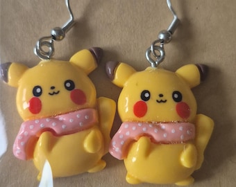 Yellow character wearing a pink scarf earrings