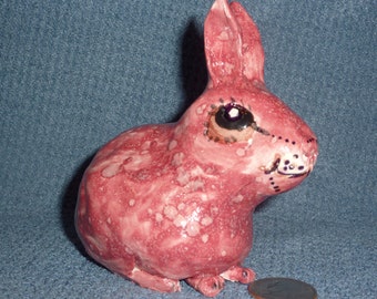 Pink Lucky Rabbit (4  intact rabbit feet) Handmade from a lump of clay in the USA . Who dos not need a little extra luck