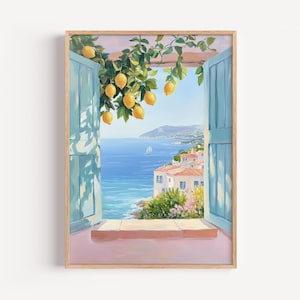 May include: A framed painting of a coastal scene seen through a window with blue shutters. Lemons hang from a branch above. The ocean and buildings with red tile roofs are visible in the distance. The painting has a light, airy feel.