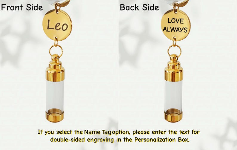 May include: A gold-colored vial pendant with a clear glass body. The front side features a gold disc with the name "Leo" engraved, while the back side says "LOVE ALWAYS". The pendant has a decorative gold top.