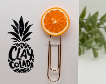 Pomarańczowa zakładka – prezent dla miłośników książek