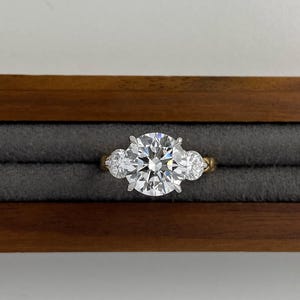 3 Carat Round Lab Grown Diamond Three Stone Ring with Ruby Accents, 18K Two Tone Gold Quilted Band, Lotus Petal Setting Engagement Ring