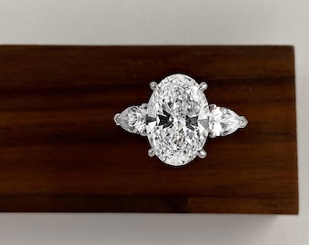 4 Carat E Color VS1 Clarity IGI Certified Oval Cut Lab Grown Three Stone Diamond Engagement Ring, Side Pear Diamonds, 14k White Gold