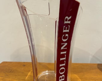 An Alessi Bollinger Perspex ice bucket by Eric Berthes.