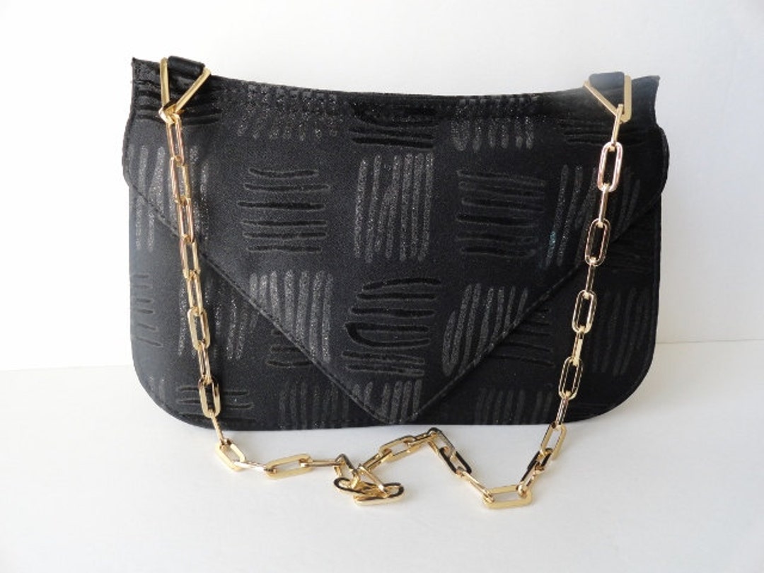 designer black bag with gold chain