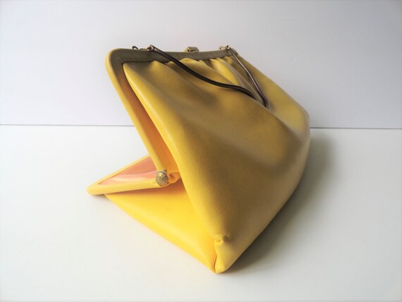yellow shoes and clutch bag