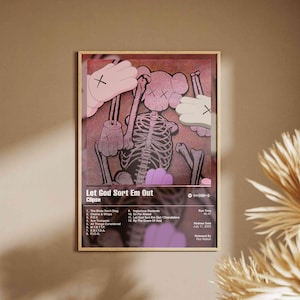 May include: Framed art print featuring a skeleton figure with KAWS-style hands and head. The artwork has a pink and purple color scheme with the text "Let God Sort Em Out" and a tracklist. Released July 11, 2005.