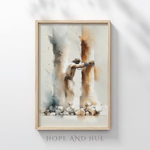 May include: Watercolor art print in a wooden frame. The artwork depicts a figure bound by chains, leaning against a pillar. The color palette includes beige, brown, and blue tones. The text "HOPE AND HUE" is printed at the bottom.