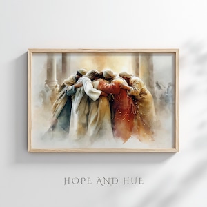 May include: Watercolor print in a light wood frame. The artwork depicts a group of figures in flowing robes embracing. The color palette includes warm tones of beige, brown, and red. The text "HOPE AND HUE" is at the bottom of the frame.