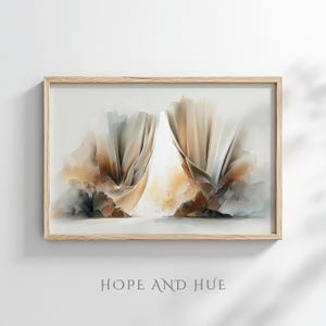 Puede incluir: Impresión artística abstracta en un marco de madera clara. La obra presenta una representación al estilo acuarela de tela fluida en tonos beige, marrón y gris. El texto "HOPE AND HUE" está impreso en la parte inferior del marco.