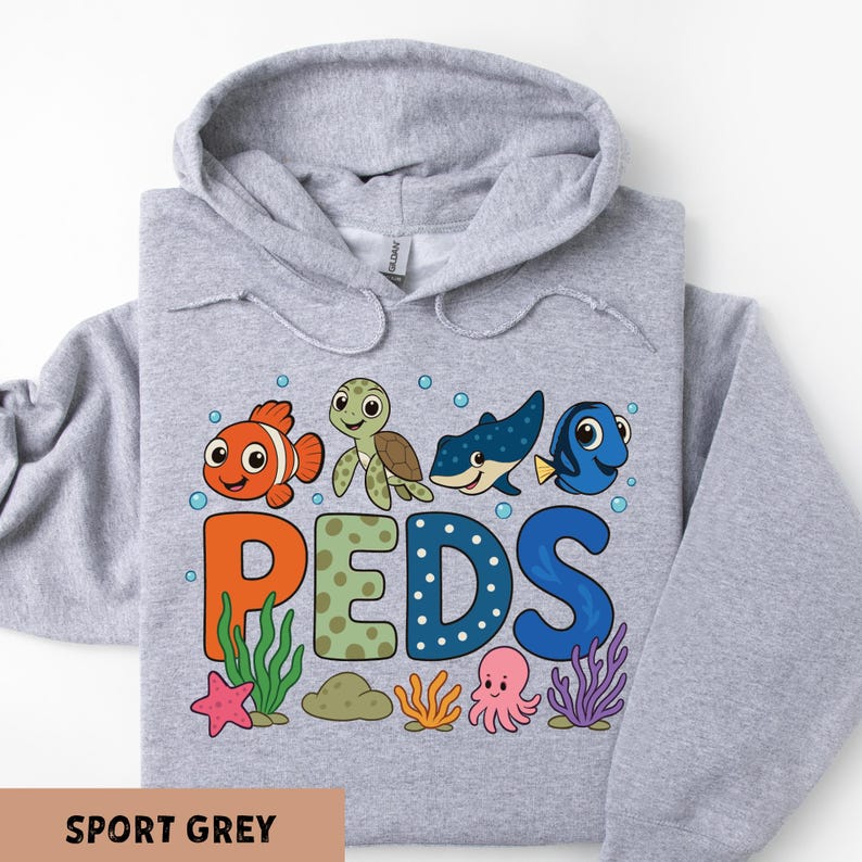 A grey hoodie with a colorful graphic design featuring cartoon sea animals and the letters 'PEDS' arranged in a playful manner.