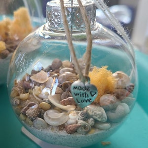 Coastal Beach Ornament filled with beach sand and sea shells