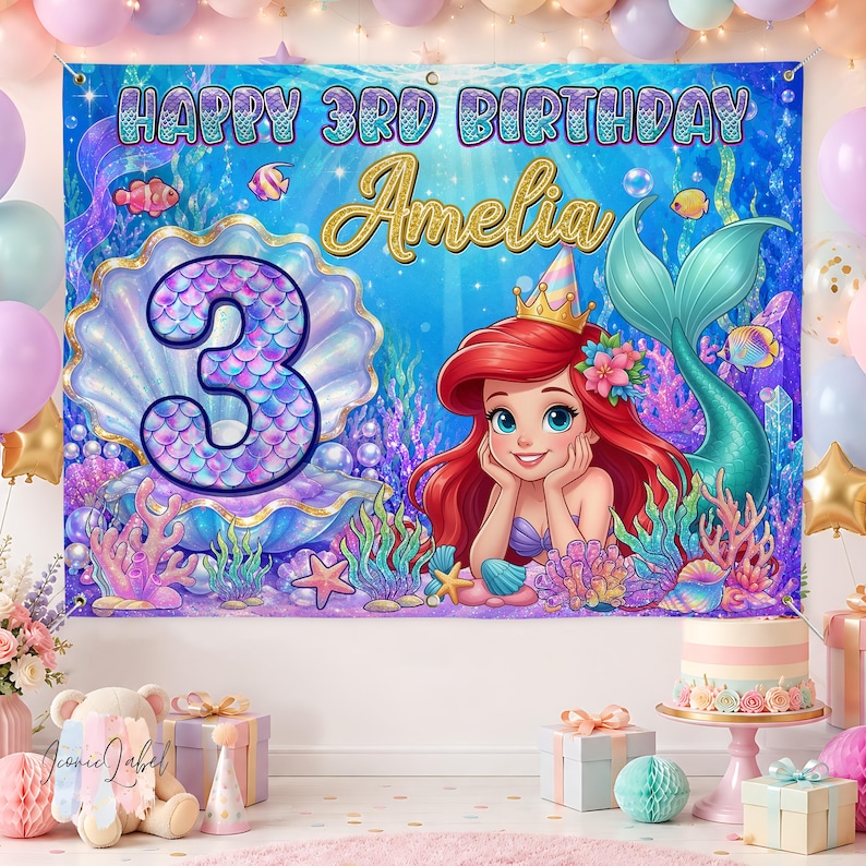 May include: A rectangular birthday banner featuring an underwater scene with a mermaid, a large seashell, and the text HAPPY 3RD BIRTHDAY Amelia. The design includes a large number 3, colorful coral, bubbles, and fish against a blue background.