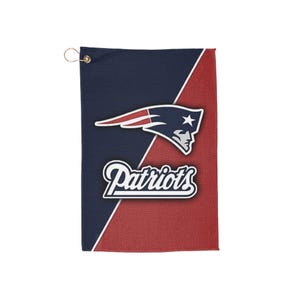 May include: A navy blue and red golf towel featuring the New England Patriots logo. The towel has a diagonal color block design with the team's logo and the word "Patriots" in white script.
