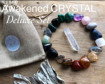 Kit de cura com cristais ético, incluindo pedras preciosas, bolsa e varinha.